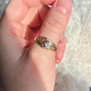 Gold Tone Ring w Purple Stone